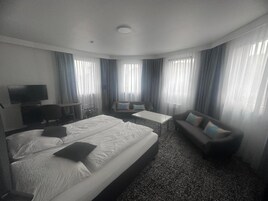 Family Triple Room, Multiple Beds, River View | In-room safe, desk, laptop workspace, free WiFi