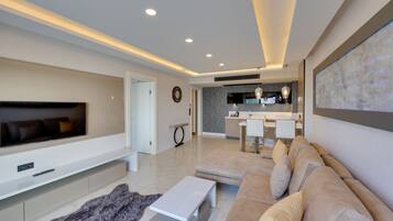Deluxe Suite | Living area | LED TV