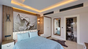 Suite Deluxe | 1 habitación, minibar, caja de seguridad en la habitación y escritorio