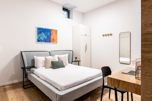 Studio Apartment (Dishon 3) | Down comforters, individually decorated, individually furnished, desk