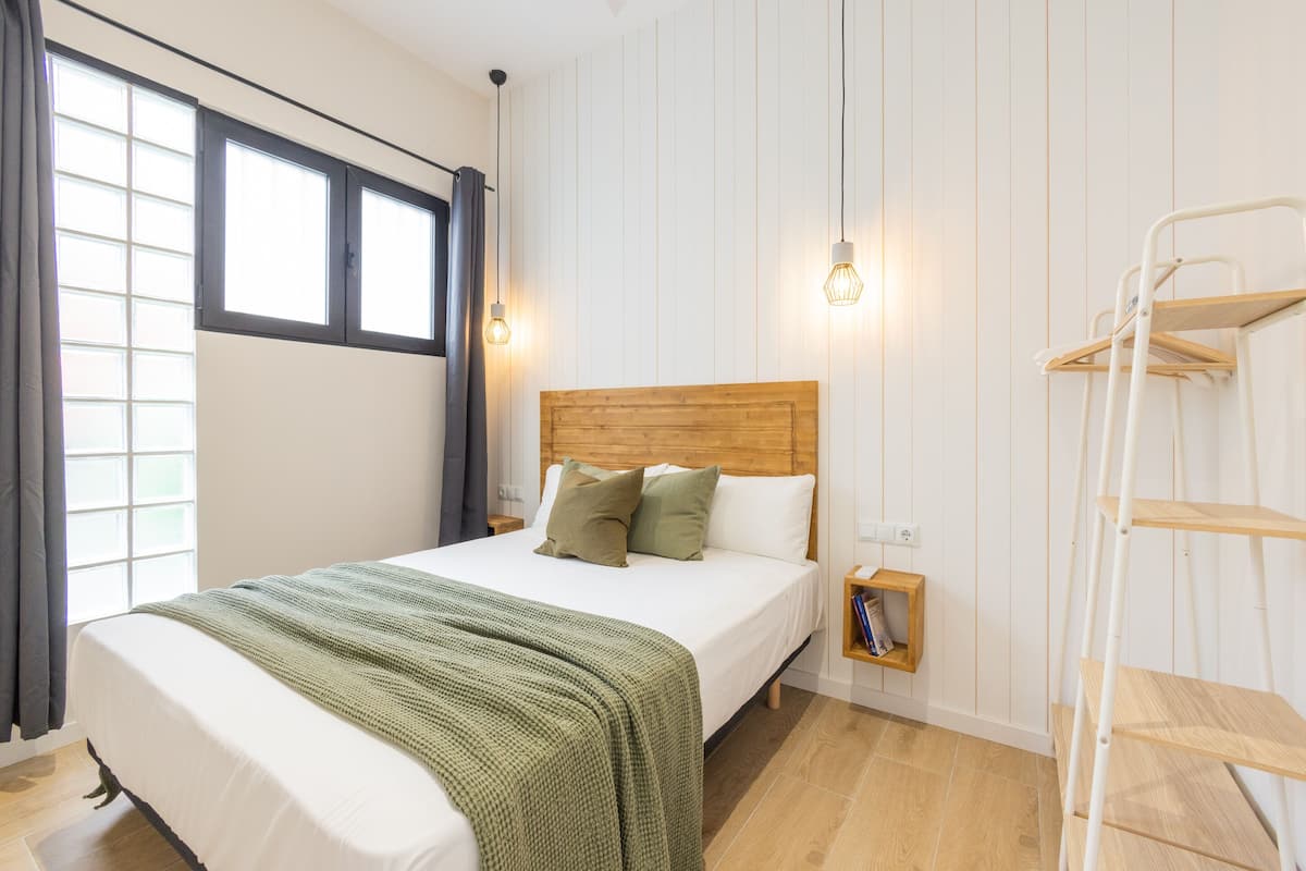 Executive vierpersoonskamer | Luxe beddengoed, donzen dekbedden, individueel gedecoreerd