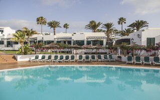 Outdoor pool, open 10:00 AM to 6:30 PM, pool umbrellas, sun loungers