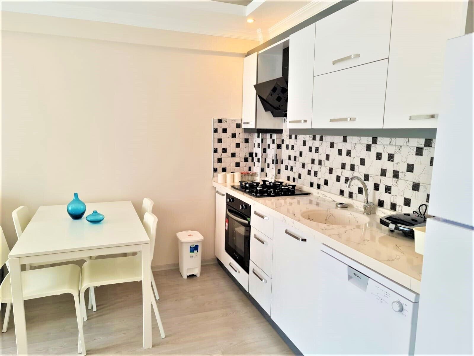 deluxe apartment | premium bedding, desk, laptop workspace, iron/ironing board