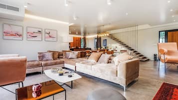 Family Villa, Multiple Bedrooms (Luxury Villa Sonia With Wellness &) | Living area | 21-inch TV with digital channels