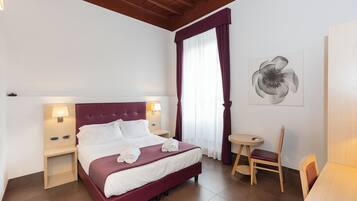 Copriletto in piuma, minibar (con alcuni snack e alcune bevande gratis)