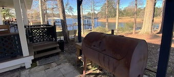 Newly Renovated Lakefront home with boat house, launch and 2 piers!