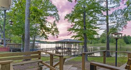 Newly Renovated Lakefront home with boat house, launch and 2 piers!