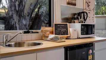 Fridge, microwave, stovetop, coffee/tea maker