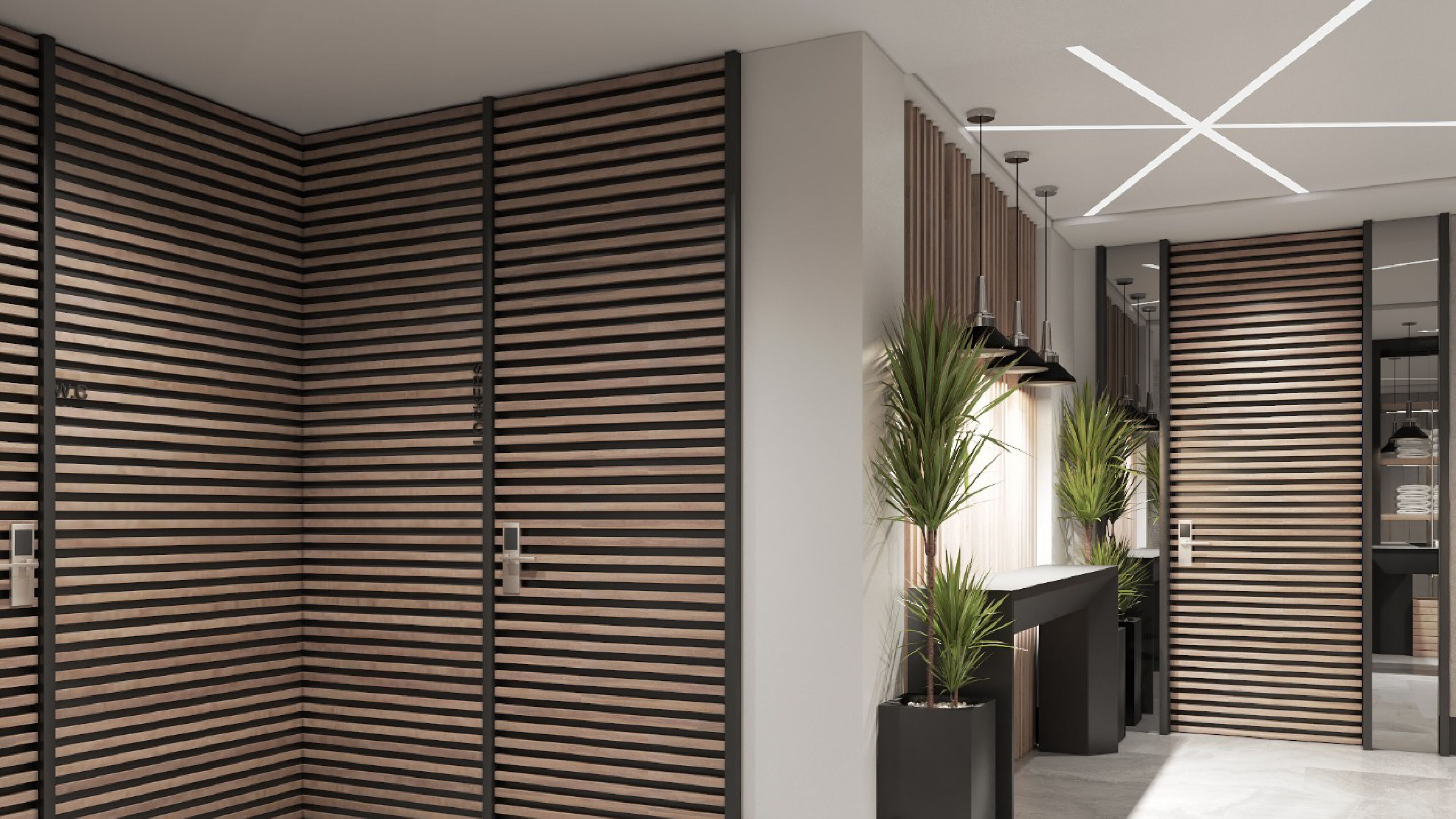 Un interior modern amb separadors de llistons de fusta, una lluminària central i plantes en testos.