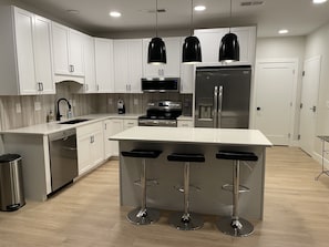 Fridge, microwave, oven, stovetop - SNL New condominium one block from West Bay. Great location. (Traverse City)
