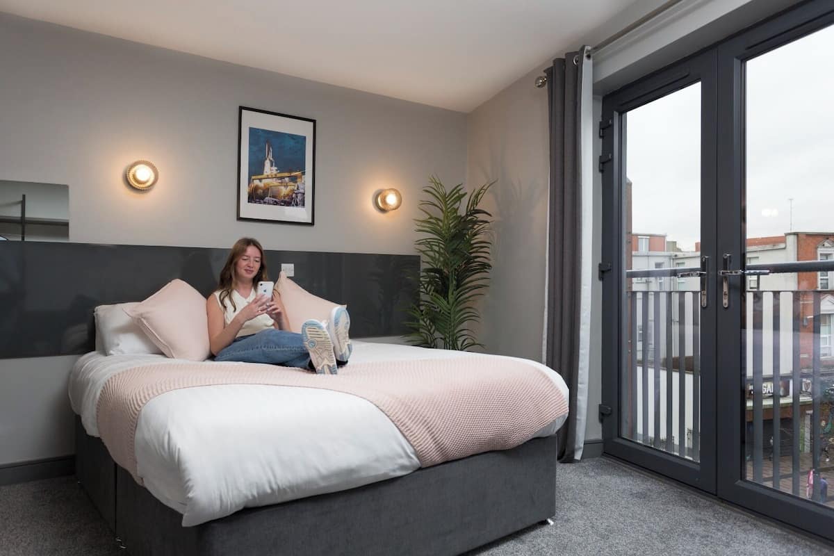 comfort triple room | memory-foam beds, desk, laptop workspace, iron/ironing board