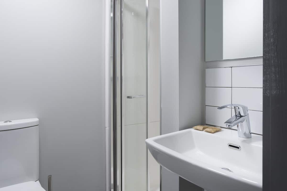 comfort single room | bathroom | shower, hair dryer, towels, soap
