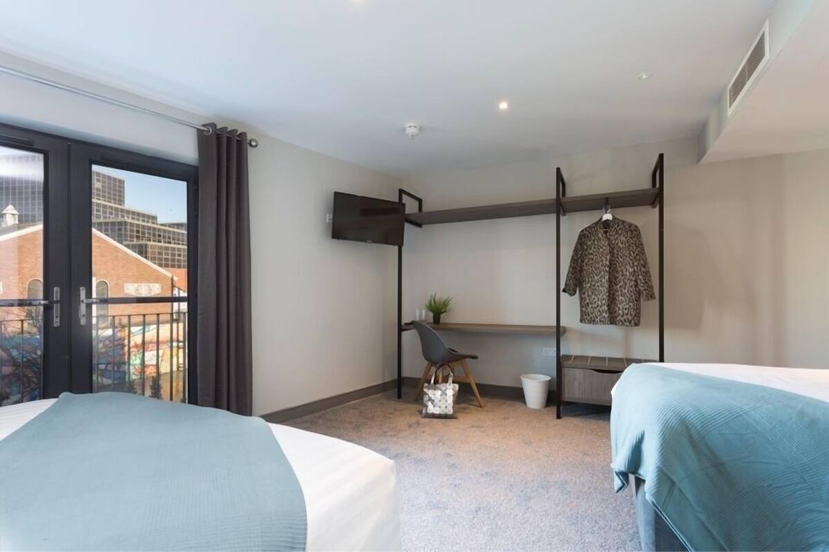 comfort triple room | memory-foam beds, desk, laptop workspace, iron/ironing board