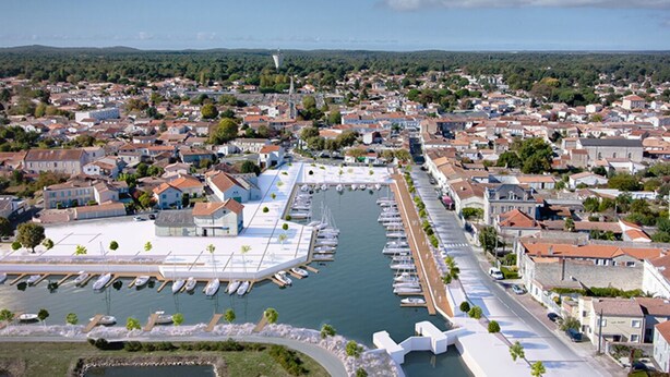 A marina with boats docked, surrounded by residential buildings and a clear sky. - Mobile home with air conditioning near the ocean and plenty of places to explore (La Tremblade)