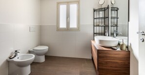 Shower, hair dryer, bidet, shampoo