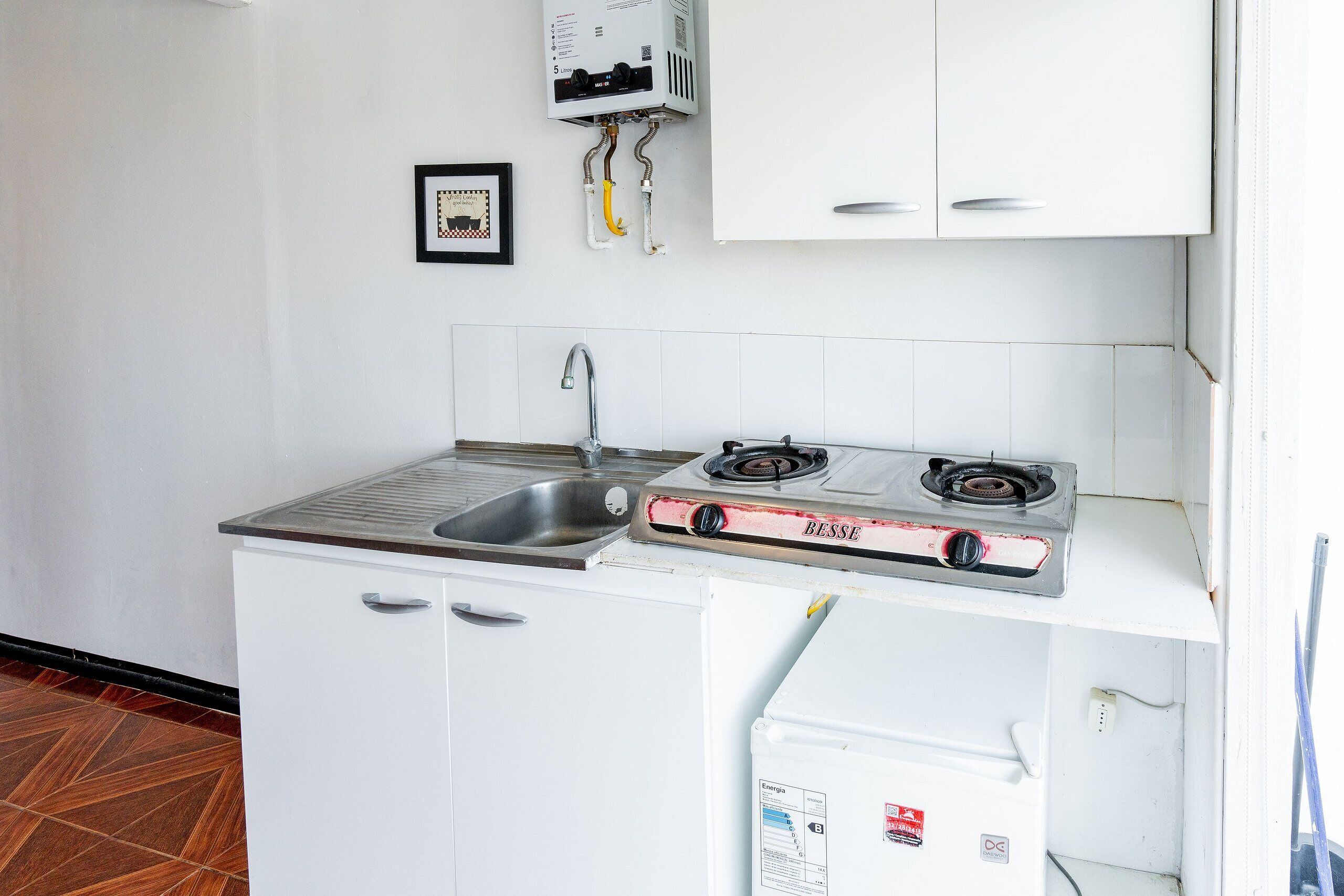 Apartamento | Cozinha privada | Frigobar, torradeira, talheres/pratos/utensílios de cozinha