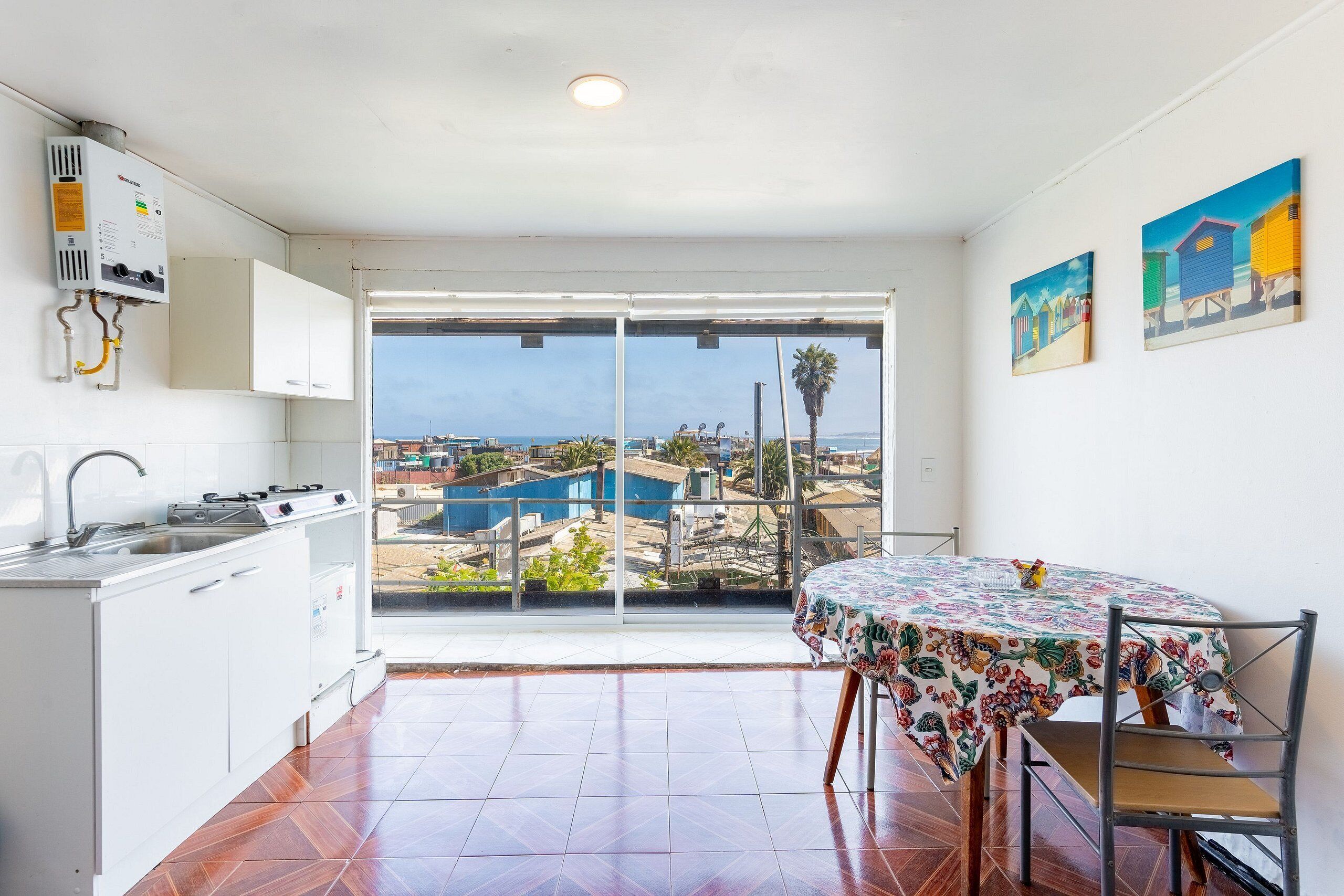 Apartment | Private kitchen | Mini-fridge, toaster, cookware/dishes/utensils, cleaning supplies