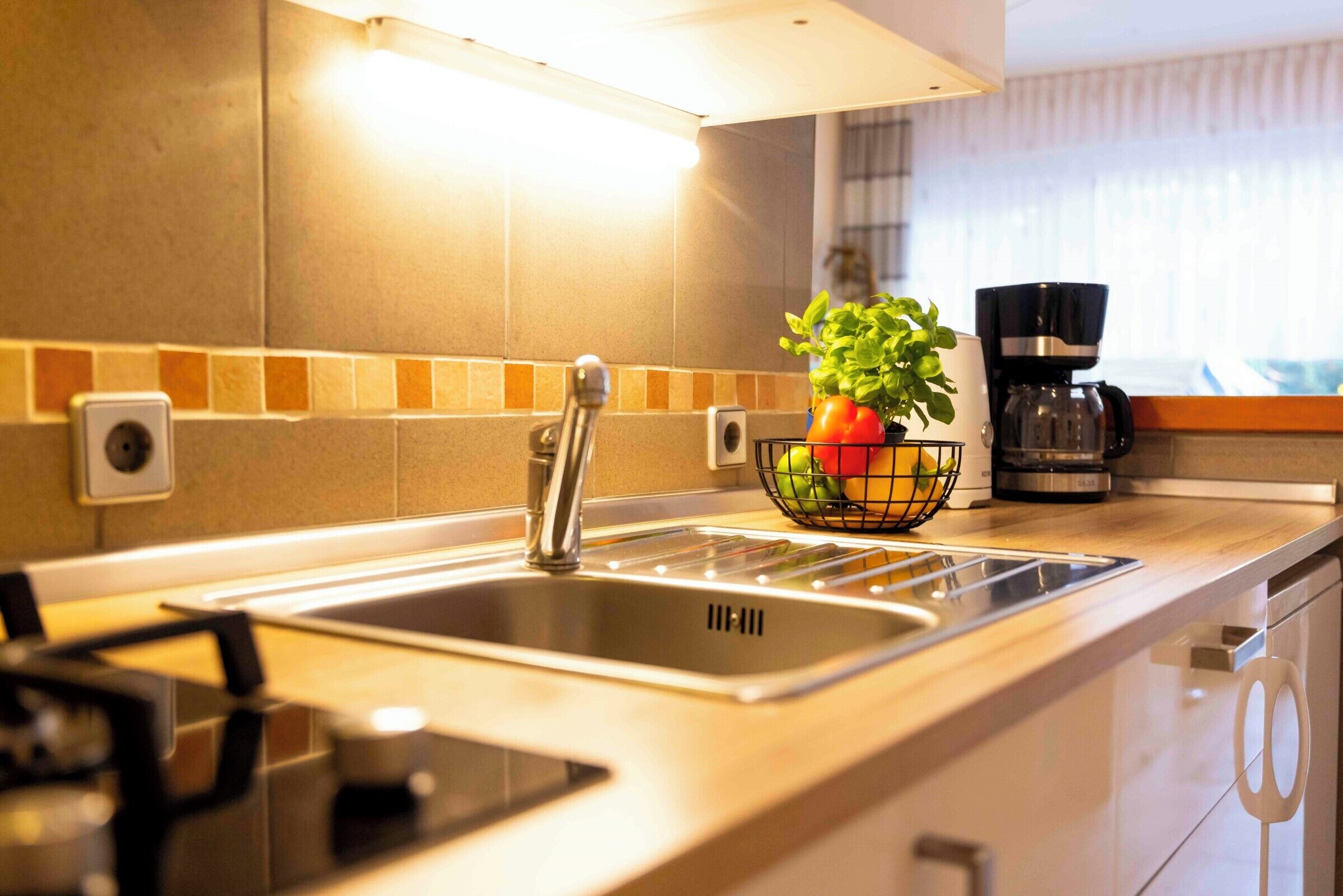 Fridge, microwave, stovetop, coffee/tea maker