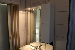 Dutxa i assecador de cabells