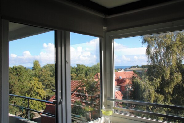 Enjoy breathtaking views of the water and surrounding landscape from your balcony.