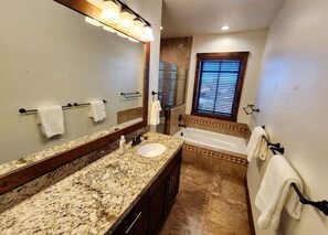 Bathtub, hair dryer, towels