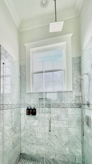 Bathtub, hair dryer, towels, soap