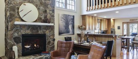 Smart TV, fireplace, books