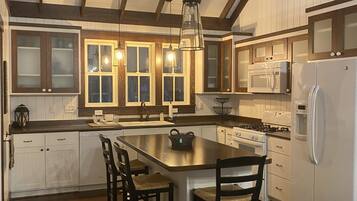 Microwave, dishwasher, ice maker, dining tables