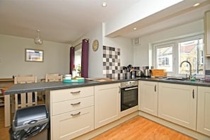 Fridge, dishwasher, cookware/dishes/utensils