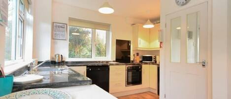 Fridge, dishwasher, cookware/dishes/utensils