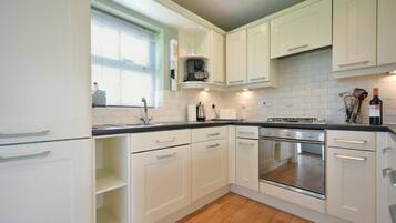 Fridge, dishwasher, cookware/dishes/utensils