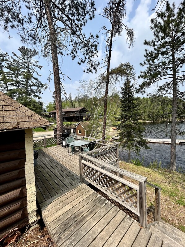 Property grounds - Rare 1930's Lakeside Log Cabin with shared hot tub and sauna! (Nestor Falls)