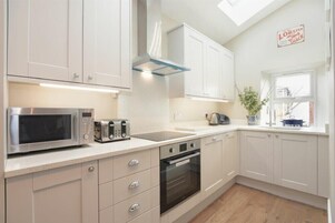 Fridge, dishwasher, cookware/dishes/utensils