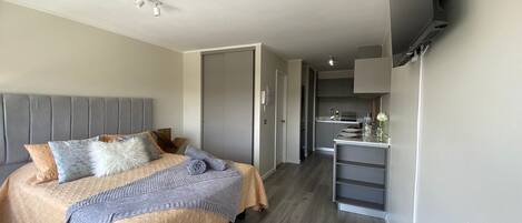 Suíte estúdio exclusiva | Wi-Fi de cortesia, roupa de cama