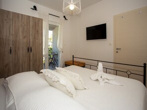 2 dormitorios, tabla de planchar con plancha, Internet y ropa de cama