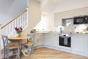Fridge, dishwasher, cookware/dishes/utensils