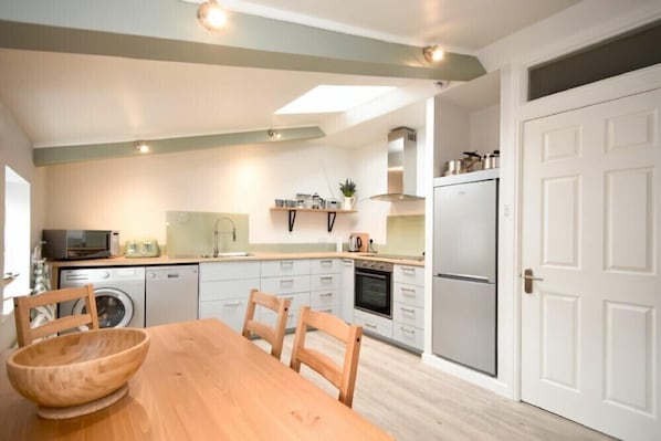 Fridge, dishwasher, cookware/dishes/utensils - Herringbone Cottage (Seahouses)