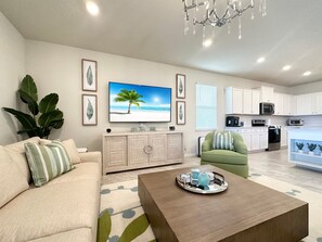 TV connectée, cheminée, jeux vidéo, lecteur de DVD