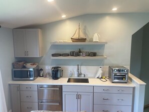 Fridge, microwave, coffee/tea maker, toaster