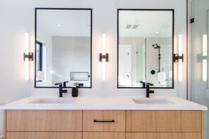 Combined shower/tub, hair dryer, towels, soap