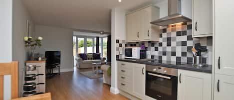 Fridge, dishwasher, cookware/dishes/utensils