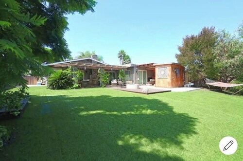 Spacious Beach Residence w Backyard Pond & Hot Tub