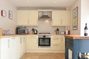 Fridge, dishwasher, cookware/dishes/utensils