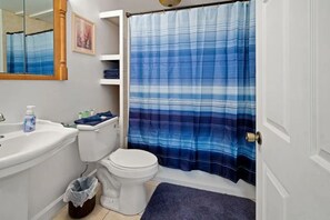 Combined shower/tub, hair dryer, towels, soap