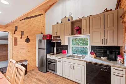 Cozy Apt w/Master BR & 2 Bed Kids Loft. Also- Covered Deck & Covered Parking.  