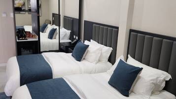 Chambre Deluxe Double ou avec lits jumeaux, 1 chambre | 1 chambre, literie de qualité supérieure, couette en duvet d'oie