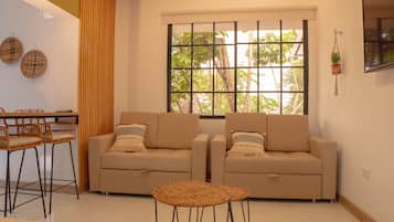 Family Room | Minibar, individually furnished, desk, free WiFi