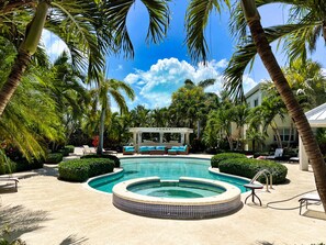 Outdoor pool - 1 Bedroom Luxury Modern Leeward Condo - 5 min walk from the beach (Leeward Settlement)