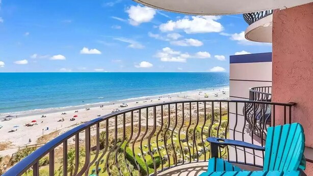 A balcony with a view of a beach and ocean. - On the Beach w/Direct Ocean Views & Beach Access within steps! RENOVATED (Myrtle Beach)