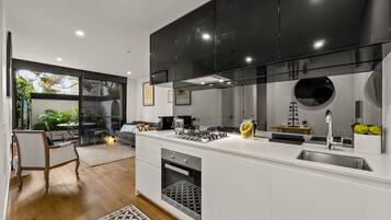 Apartment | Private kitchen | Full-size fridge, microwave, oven, stovetop